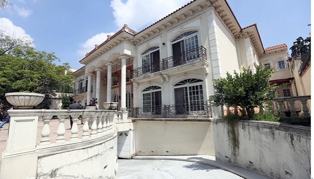 Niegan a Zhenli suspender registro de casa